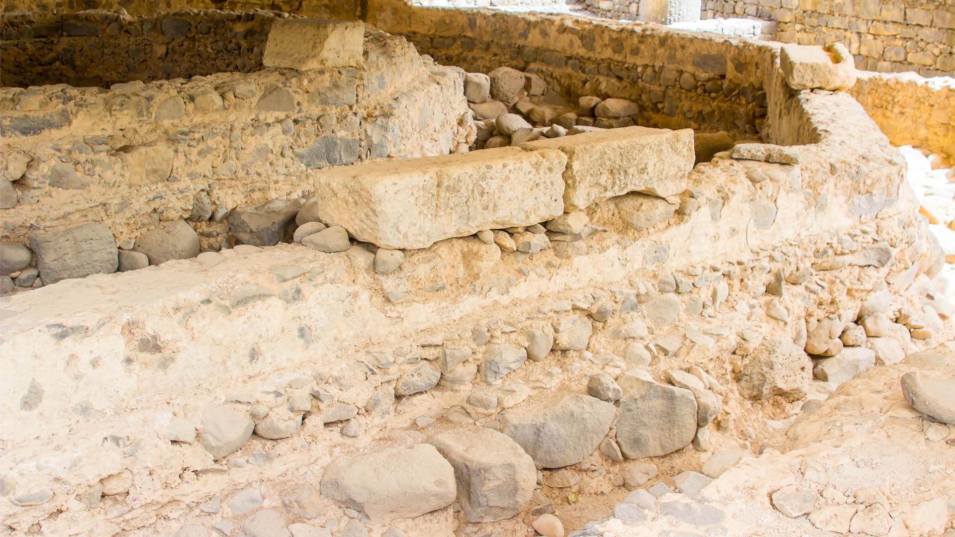 The walls and foundation of the Apostle Peter's house - the rock on which the church was built.